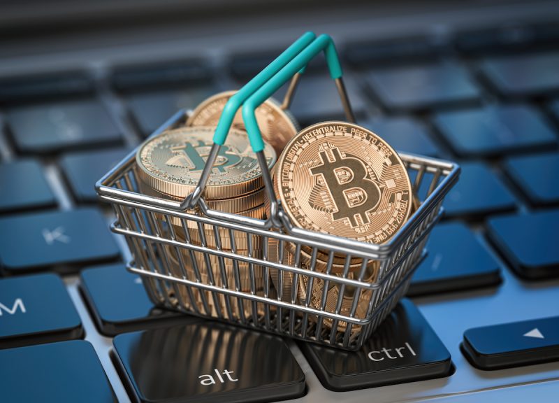 bitcoin-coins-in-shopping-basket-on-laptop-keyboar-2021-11-02-22-23-55-utc.jpg