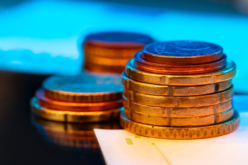 close-up-of-coins-stacked-on-each-other-2023-11-27-04-54-13-utc.jpeg