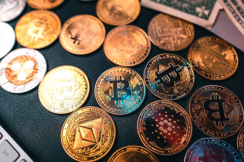 crypto-coins-and-money-on-the-desktop-2021-10-21-22-06-20-utc.jpg