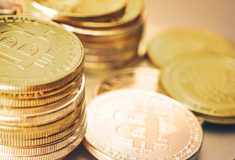 pile-of-golden-bitcoin-coins-close-up-2022-12-16-11-43-37-utc.jpeg